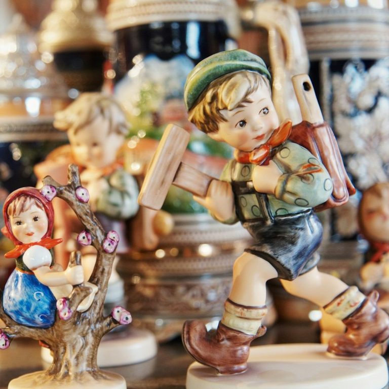 Photo of porcelain doll dressed in swiss clothing to show the type of items you might find at our auctions